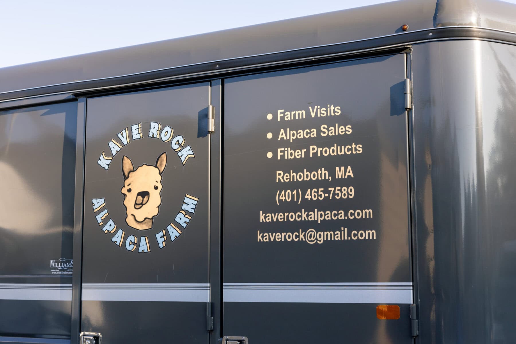 Stunning Wedding at the Roger Williams Botanical Gardens 48 A black vehicle with "Kave Rock Alpaca Farm" logo, perfect for farm visits, alpaca sales, fiber products, or your wedding at Roger Williams Botanical Gardens.