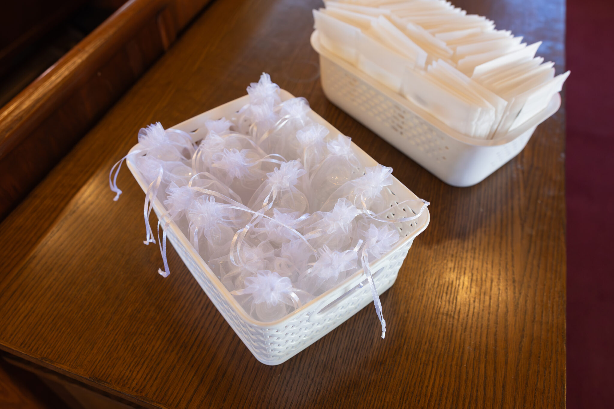 Wedding At St. Mary's Church in North Attleborough 20 A basket of white plastic bags, perfect for a wedding at St. Mary's Church in North Attleborough.